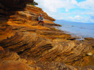 Exploring the painted cliffs on Maria Island