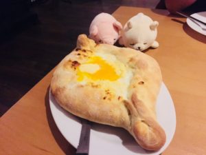 Enjoying an Adjarian Khachapuri