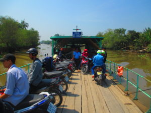 Catching a ferry between islands and islets in Vinh Long province - Mekong Delta, Vietnam